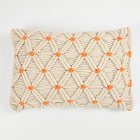 Macrame Cushion cover with orange accents