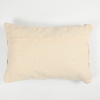 Macrame Cushion cover with orange accents
