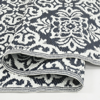 Reversible Blue and White Geometric Carpet