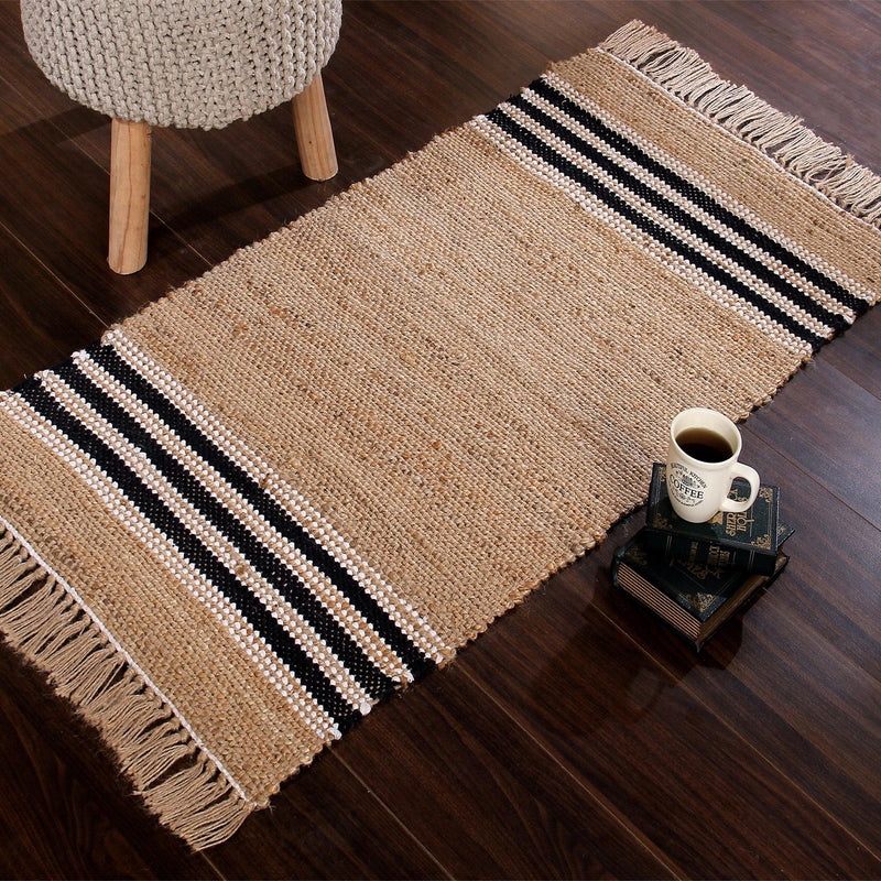 Handwoven jute rug with black and white stripes  and tassels at the end. - Sashaaworld